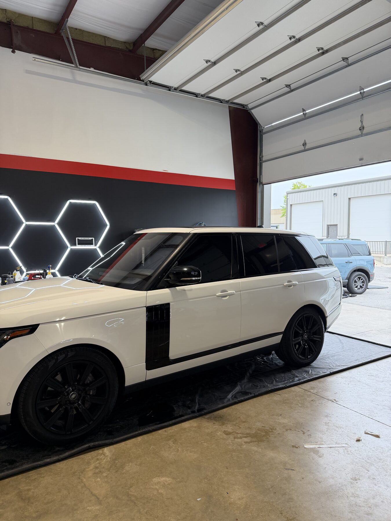 White Range Rover with ceramic window tint at Lukas Mobile Detailing Kansas City